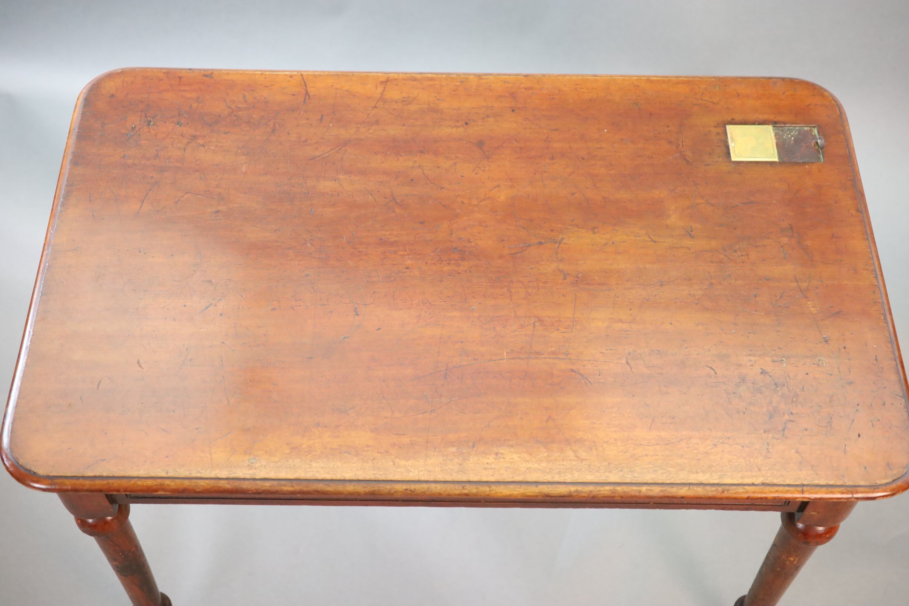 A Victorian mahogany writing table, W.114 D.70cm H.76cm